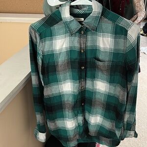 green and white american eagle flannel